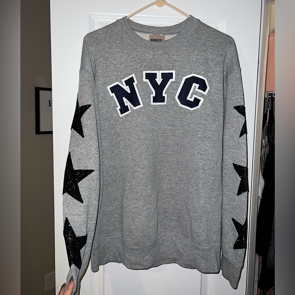 NYC gray sweatshirt with sparkle stars on sleeves!